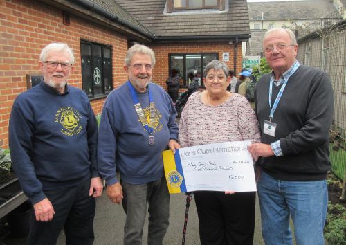 Lion Carole Hambleton presents a cheque for £1,000 to Simon Gordell at the Aldershot Grub Hub. Lion Carole Hambleton presents a cheque for £1,000 to Simon Gordell at the Aldershot Grub Hub.