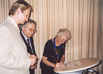 Marion Signing the Twinning Documents.